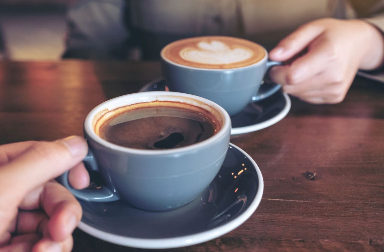 Two blue cups of coffee