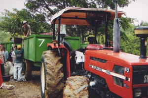 Red tractor and harvesters at Santa Elena